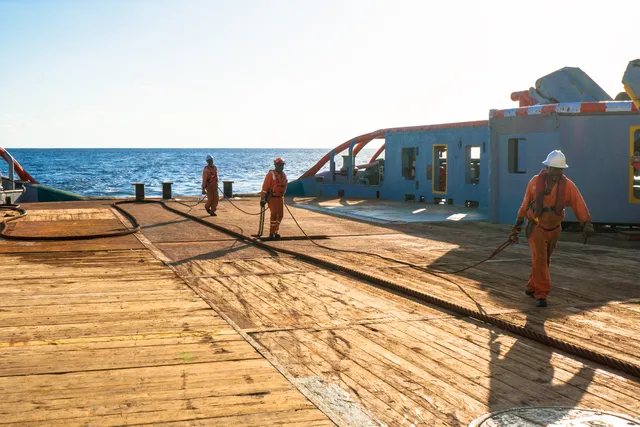 Ship crew working on the deck of a vessel
